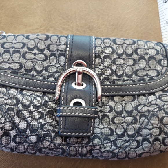 Coach Handbags - Coach signature black canvas Wristlet NWOT.